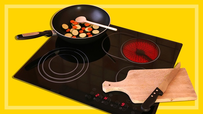cooking vegetables in pan on induction cooktop